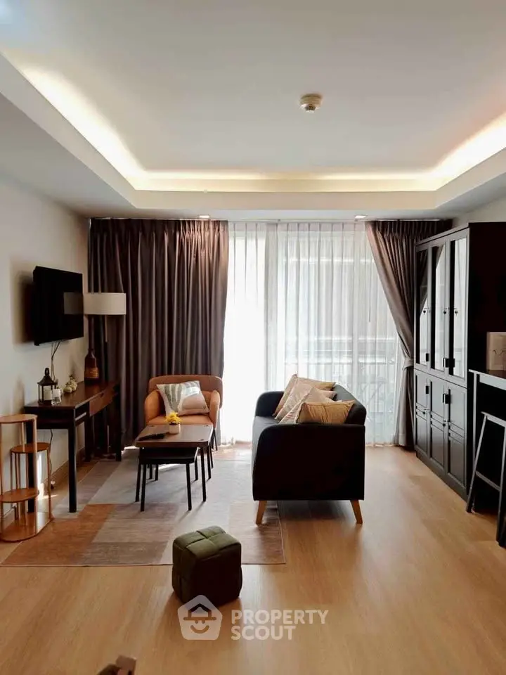 Spacious modern living room with elegant decor and natural light