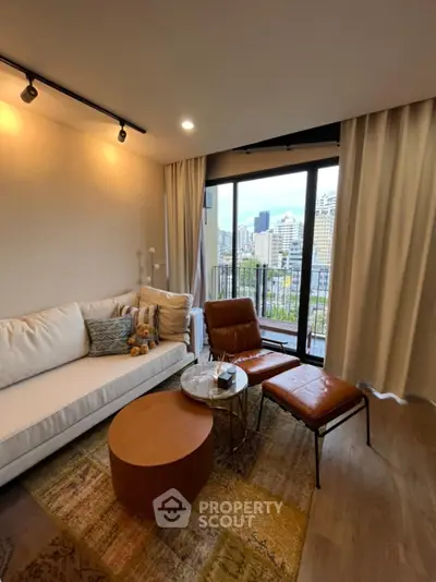 Modern living room with city view, stylish furniture, and floor-to-ceiling windows in urban apartment.