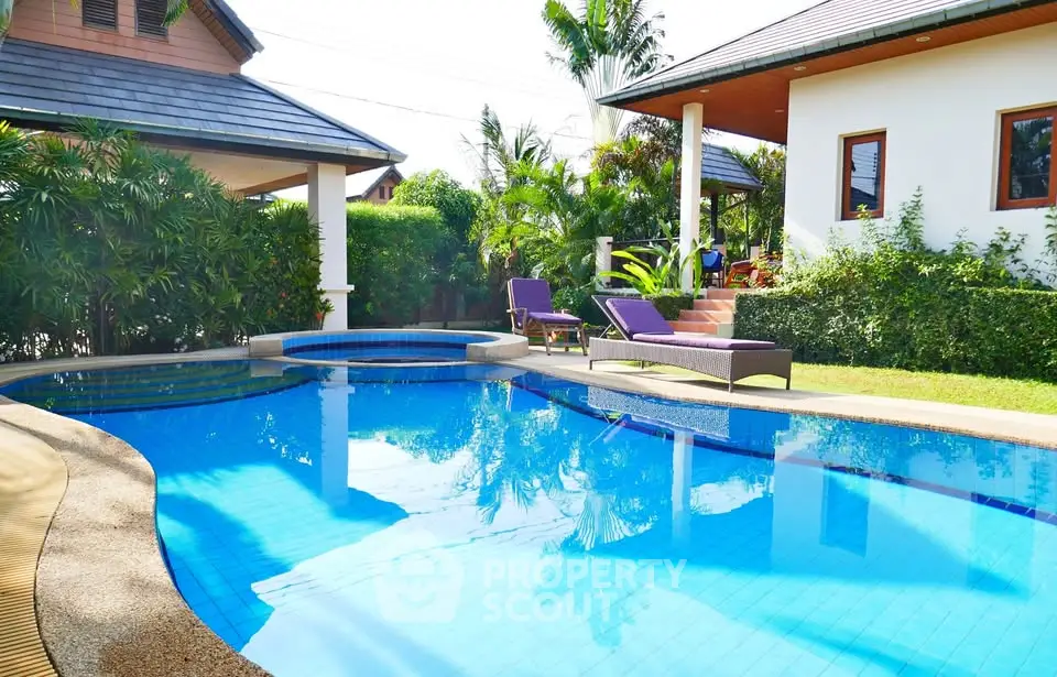 Luxurious villa with private pool and lush garden, perfect for relaxation and entertaining.