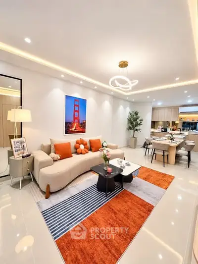 Modern living room with stylish decor and open kitchen layout