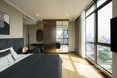 Luxurious bedroom with panoramic city view and modern decor