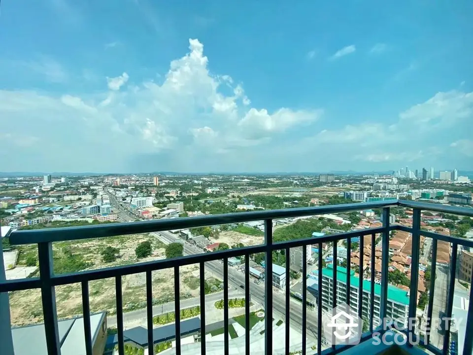 Stunning high-rise balcony view overlooking cityscape and skyline