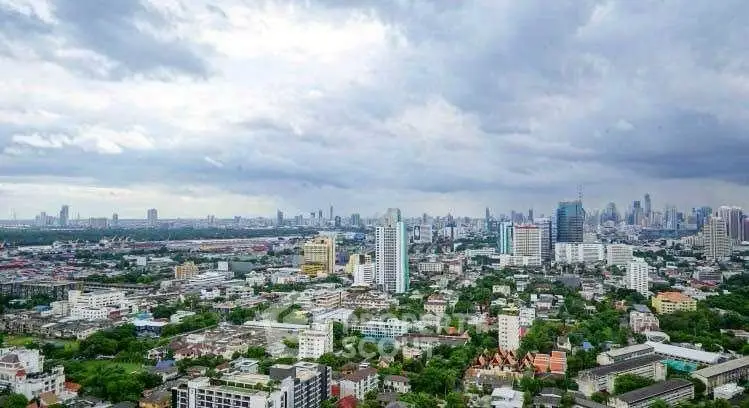 Stunning cityscape view showcasing urban skyline and lush greenery.