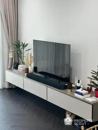 Modern living room with sleek TV setup and stylish decor