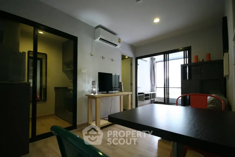 Modern living room with open layout and stylish furniture in a contemporary apartment.