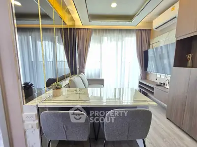 Modern living room with stylish decor and marble dining table