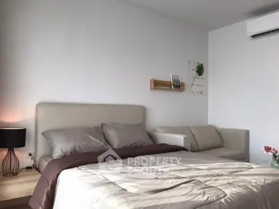 Modern bedroom with cozy bed and stylish decor in a contemporary apartment