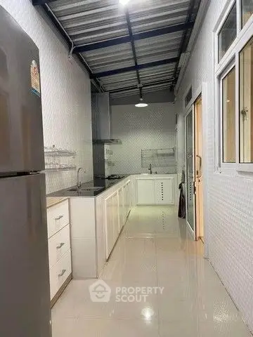 Modern kitchen with sleek design and stainless steel appliances