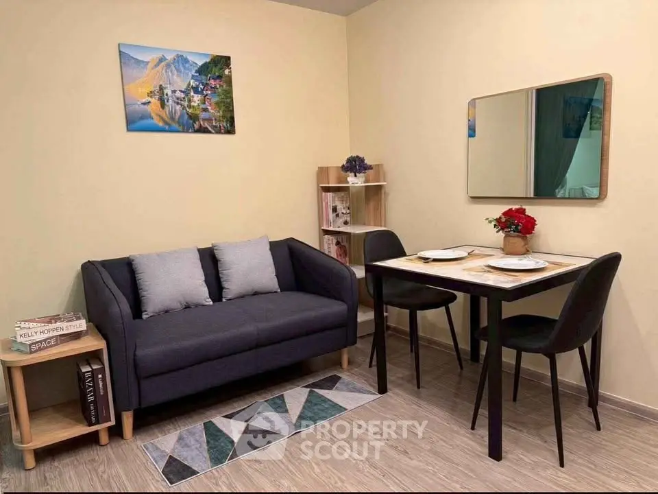 Cozy living room with modern sofa and dining area, perfect for urban living.
