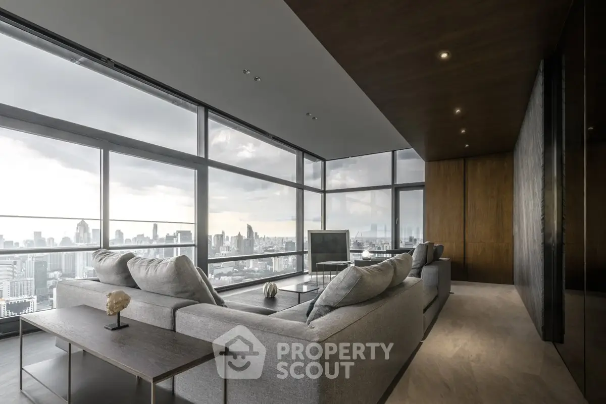 Luxurious modern living room with panoramic city view and elegant decor