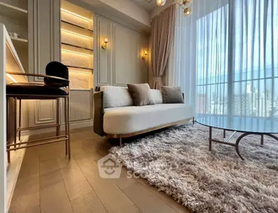 Luxurious living room with plush rug, elegant sofa, and floor-to-ceiling windows offering city views.