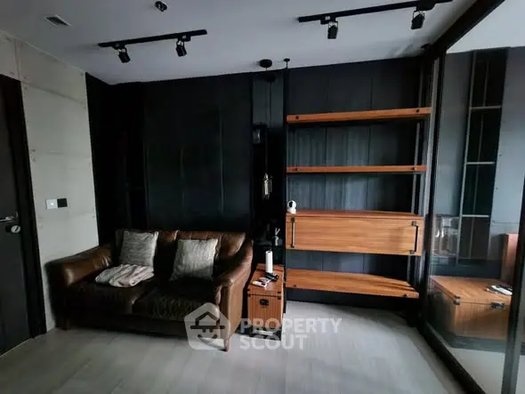 Modern living room with leather sofa and sleek wooden shelves