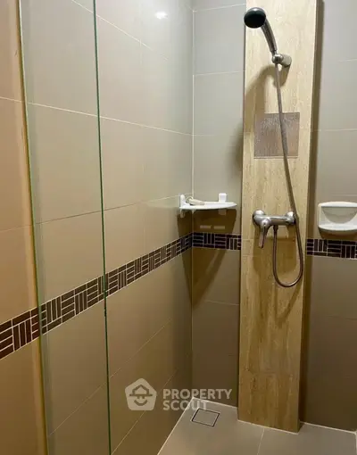 Modern bathroom with sleek shower design and elegant tile work