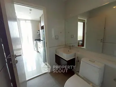 Modern bathroom with sleek fixtures and bright natural lighting