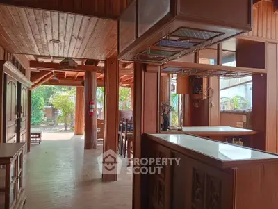 Stunning wooden interior with open layout and natural light, perfect for a cozy and inviting living space.