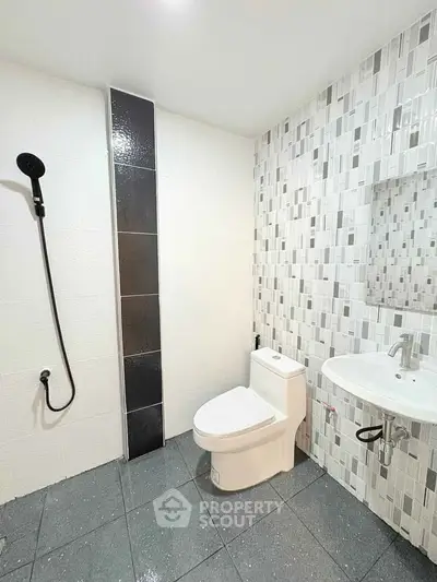 Modern bathroom with sleek design and contemporary fixtures.