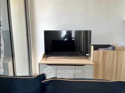 Modern living room with sleek TV stand and stylish decor