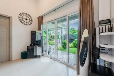Spacious modern living room with garden view and stylish decor