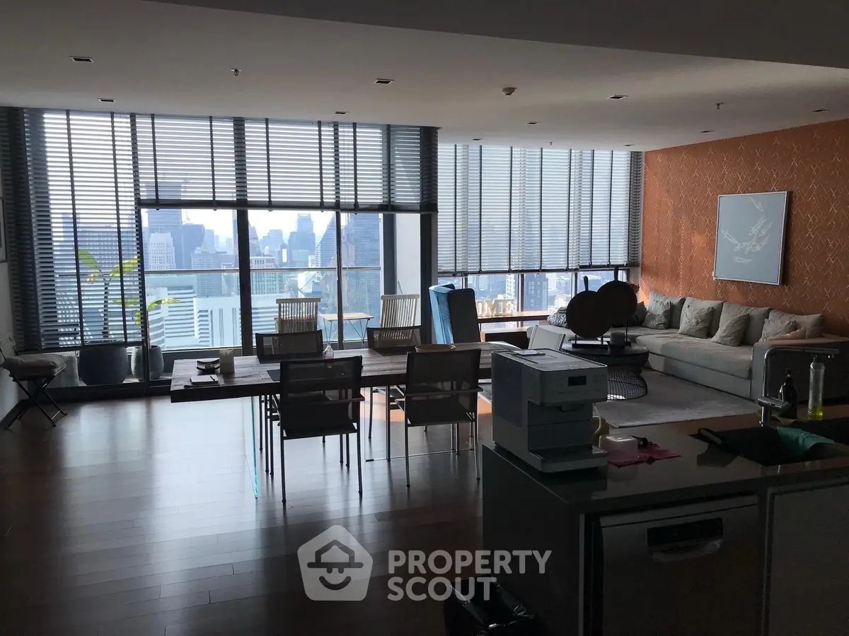 Luxurious living room with panoramic city view and modern decor