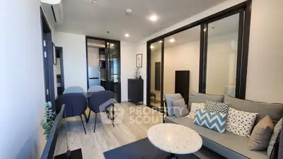 Modern living room with stylish decor and open layout in a contemporary apartment.