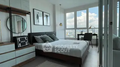 Modern bedroom with city view and stylish decor