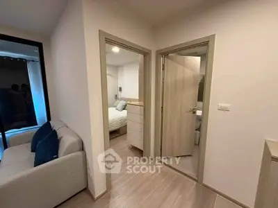 Modern apartment interior with cozy living room and bedroom view