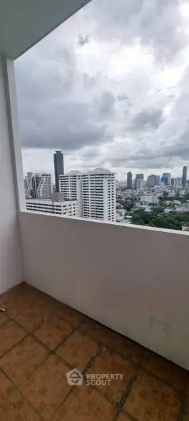 Stunning cityscape view from a high-rise balcony, perfect for urban living.