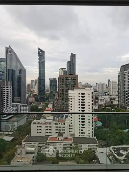 Stunning cityscape view from high-rise apartment balcony