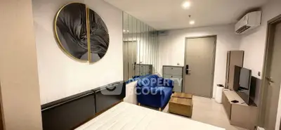 Modern studio apartment with stylish decor and cozy furnishings