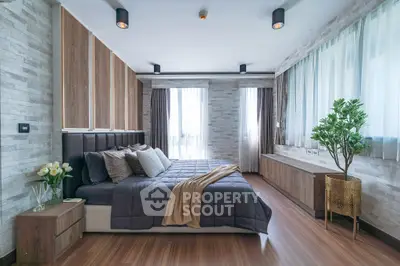 Luxurious modern bedroom with elegant decor and natural light