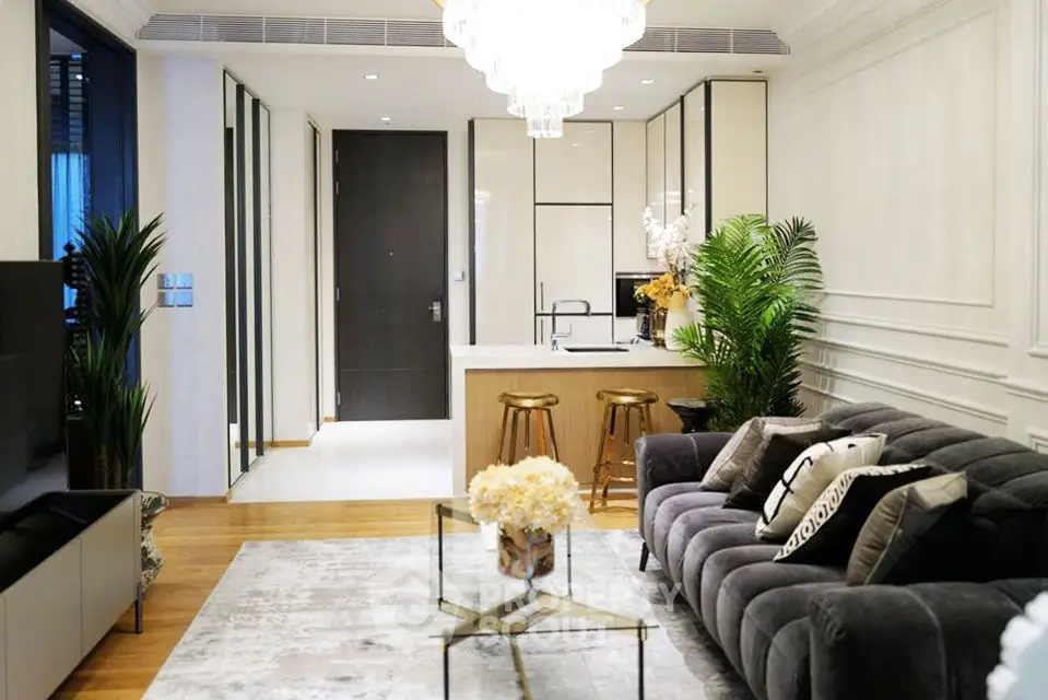 Luxurious modern living room with elegant decor and open kitchen layout