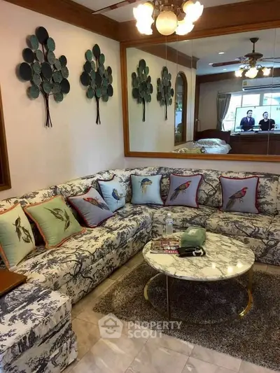 Charming living room with elegant sectional sofa and stylish decor