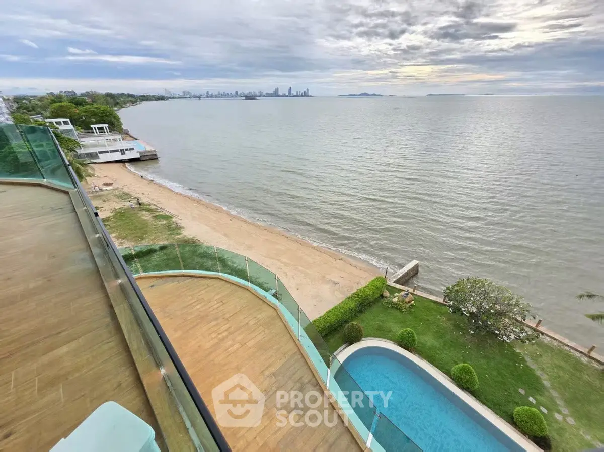 Stunning beachfront property with panoramic ocean views and private pool, perfect for luxury living.