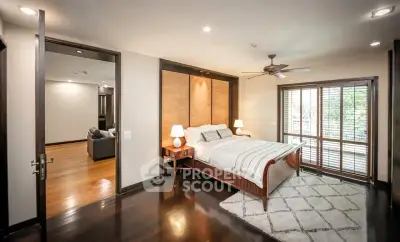 Luxurious bedroom with elegant wooden flooring and stylish decor