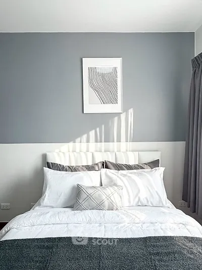 Cozy bedroom with modern decor and natural light