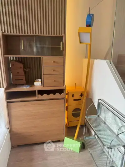 Modern interior with stylish wooden furniture and unique decor elements in a cozy setting.