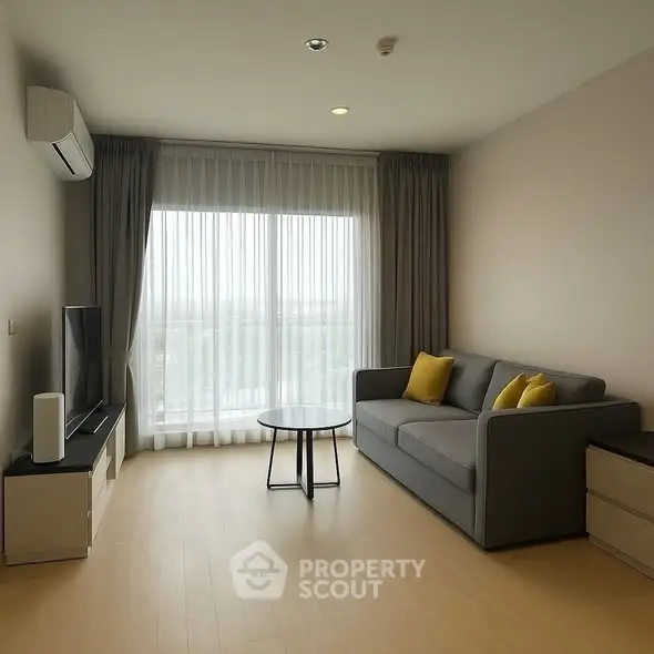 Modern living room with large window and stylish furniture