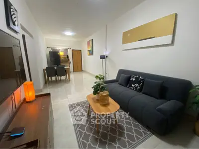 Spacious modern living room with stylish decor and cozy seating area