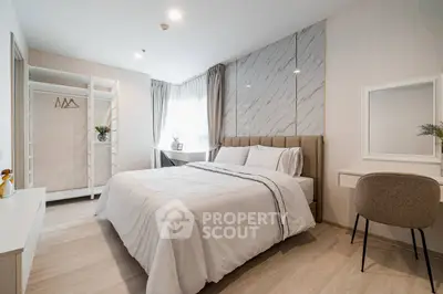 Modern bedroom with stylish decor and natural light