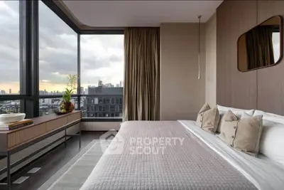 Luxurious bedroom with panoramic city view and elegant decor