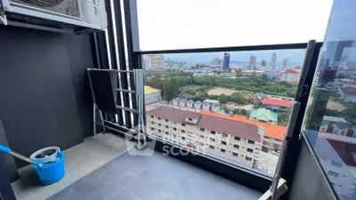 Stunning city view from a modern balcony with sleek design and ample space.