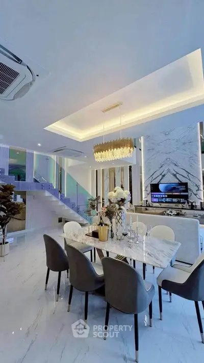 Luxurious modern living room with elegant dining area and stylish decor