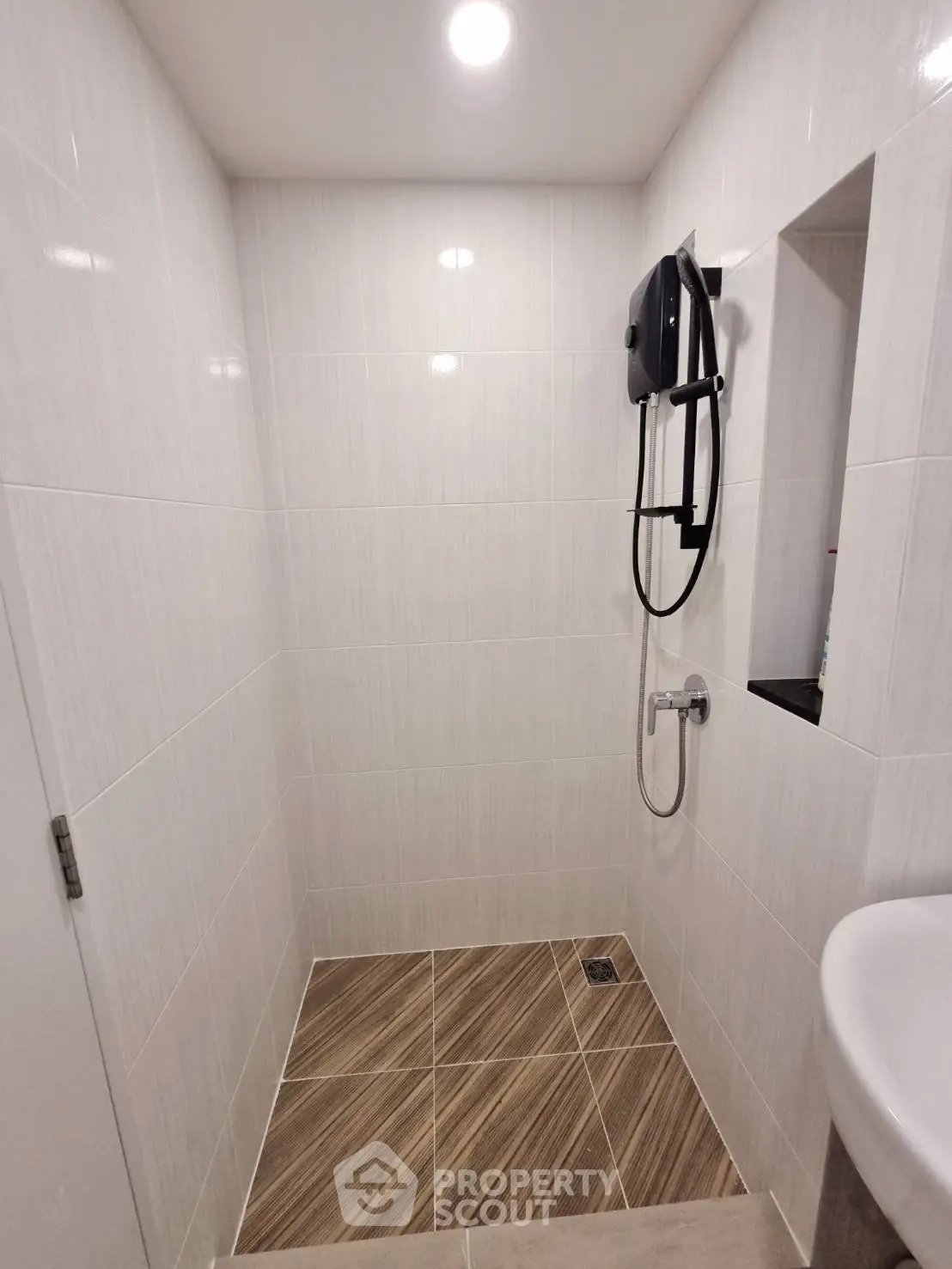 Modern bathroom with sleek tiles and shower area