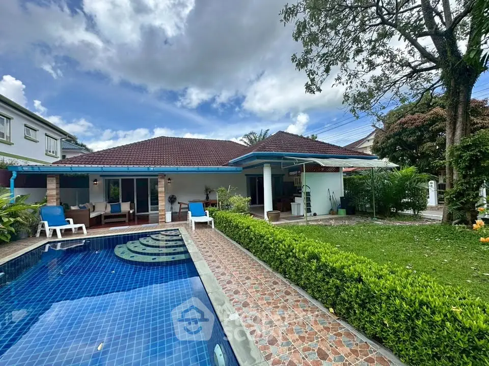 Charming suburban home with pool and lush garden, perfect for family living.