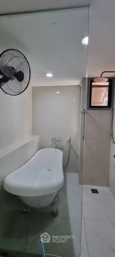 Modern bathroom with elegant freestanding bathtub and sleek fixtures
