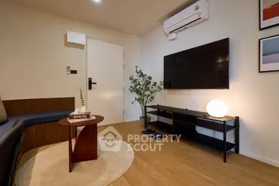 Modern living room with sleek TV setup and stylish decor