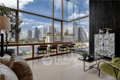 Luxurious living room with panoramic city views and modern decor