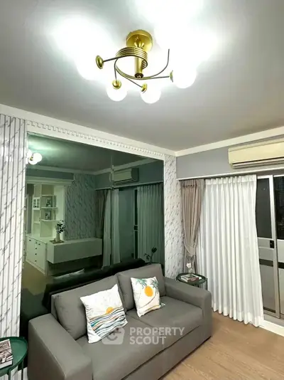 Modern living room with stylish lighting and cozy sofa in a chic apartment