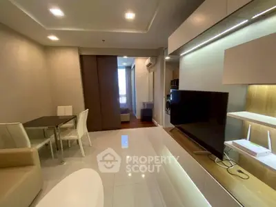 Modern living room with sleek furniture and open layout, perfect for urban living.