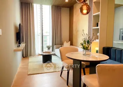 Stylish modern living room with elegant decor and large window view